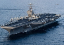 American aircraft carrier has been shadowed by Iranian navy through Hormuz Strait