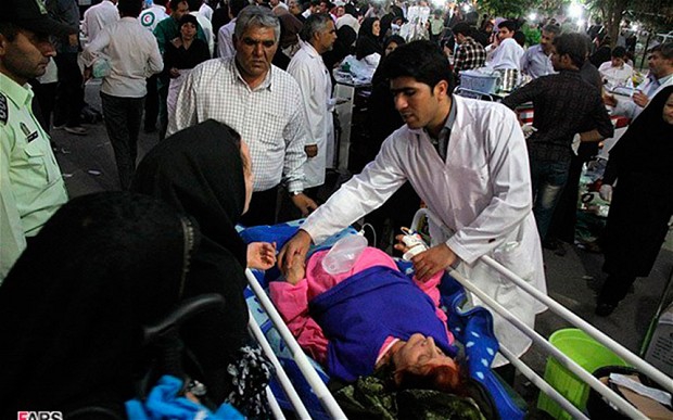 Iranian hospitals struggle to cope after earthquakes leave 250 dead