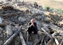  Iran raises quake death toll more than 300