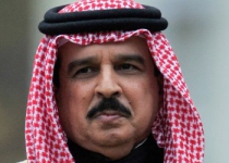 Bahrain king blasts foreign links to unrest in swipe at Iran