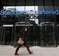 Standard Chartered agrees to settle Iran money transfer claims