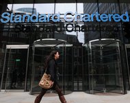 Standard Chartered agrees to settle Iran money transfer claims