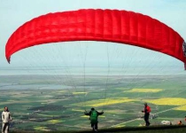 Photos: Paragliding in Mazandaran, Iran  <img src="https://cdn.theiranproject.com/images/picture_icon.png" width="16" height="16" border="0" align="top">