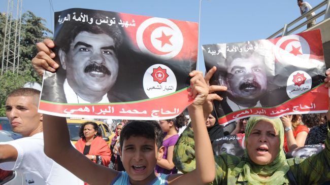 Tunisian police use tear gas to disperse protesters