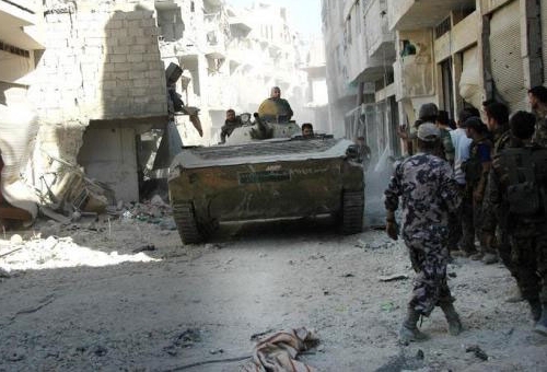 Army regains strategic district near Damascus