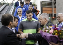 Photos: Iranian Greco-Roman wrestlers return home  <img src="https://cdn.theiranproject.com/images/picture_icon.png" width="16" height="16" border="0" align="top">