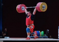 Lifter Bahador Moulaei dedicates medal to his coach