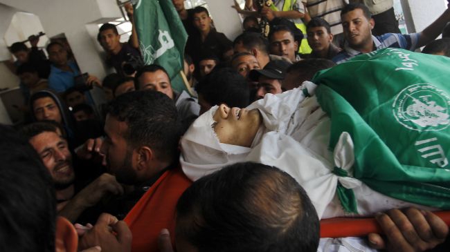 Gazans hold mass funeral for Israel attack victim