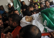 Gazans hold mass funeral for Israel attack victim