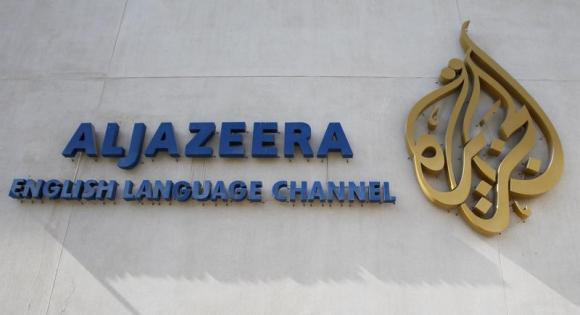 Al Jazeera says three journalists held in Egypt after hotel broadcast