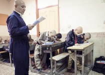 Hairless hero: Iranian teacher shaves head in solidarity with bullied pupil