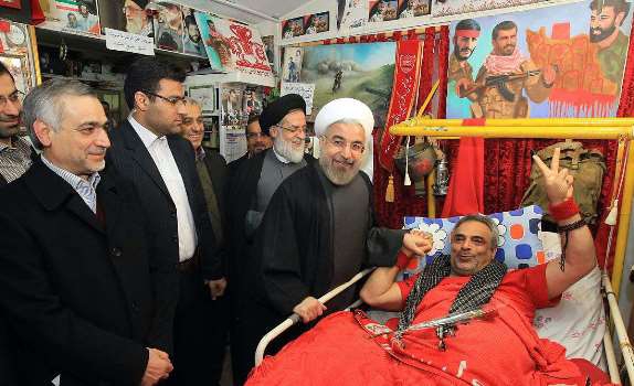 Rouhani visits war invalids rehabilitation center