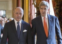  Business trip to Iran "not helpful", Kerry tells France