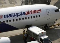 Malaysia Airlines: passengers with stolen passports booked tickets together