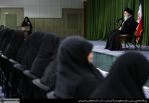 Leader addresses the meeting of a group of women intellectuals