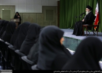 Leader addresses the meeting of a group of women intellectuals