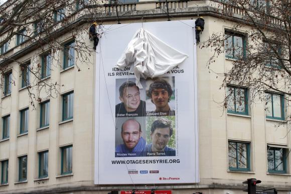 Four French journalists captive in Syria freed