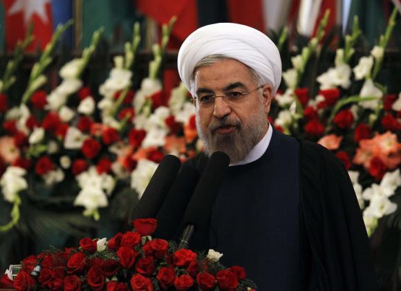 Politics, markets complicate Rouhani