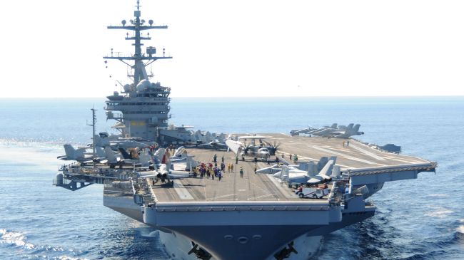 US warship, 50 fighter jets ready in Persian Gulf as Iraq crisis escalating