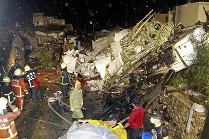 Plane crashes in Taiwan, 47 trapped, feared dead