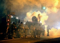Dozens arrested in Ferguson after night of violence
