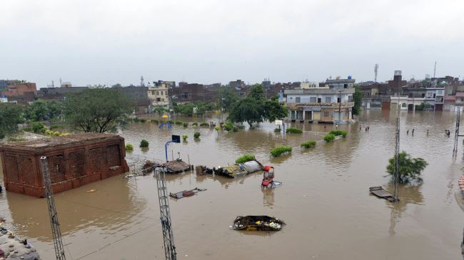 Heavy rains, flooding kill dozens in Pakistan, India