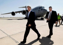 9 killed in 3 bombings as Kerry arrives in Baghdad