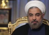 President Rouhani slams US-led coalition against ISIL
