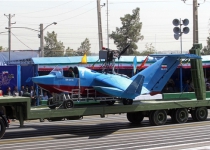 Iran unveils new air defense system, new drone in military parades