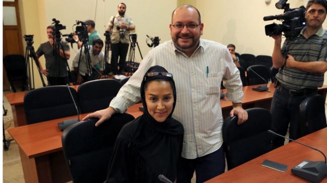 Iran frees wife of Posts Tehran correspondent, but he remains in custody