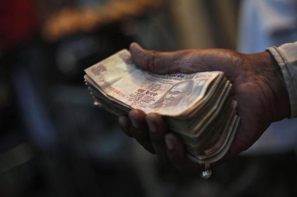 Rupee at 8-1/2 month low; Iran payments hurt
