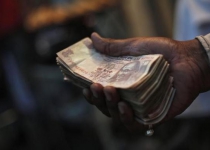 Rupee at 8-1/2 month low; Iran payments hurt