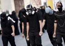 Bahrain riot police attack anti-election protesters 