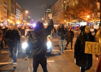 Demos condemn grand juries for not charging cops for killing blacks