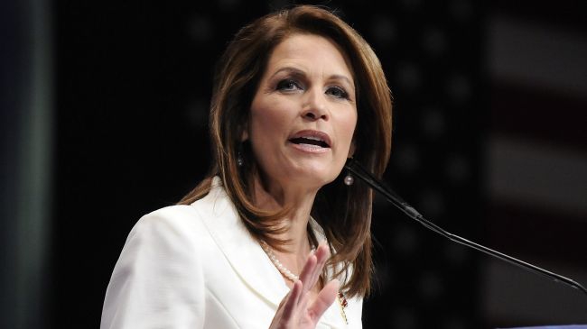 Obama laughs at Bachmann over request to bomb Iran