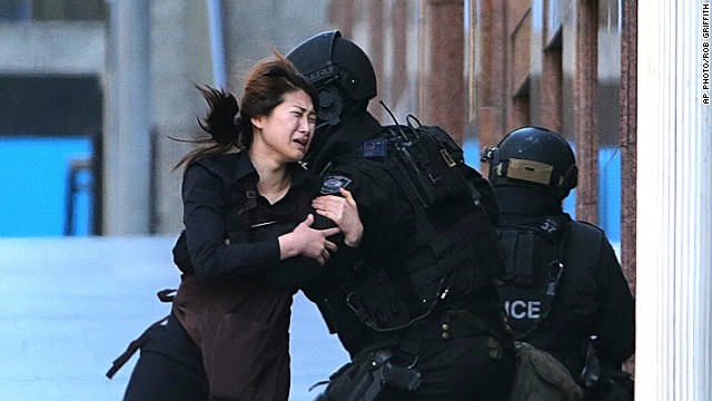 Five people flee from Sydney cafe amid hostage drama