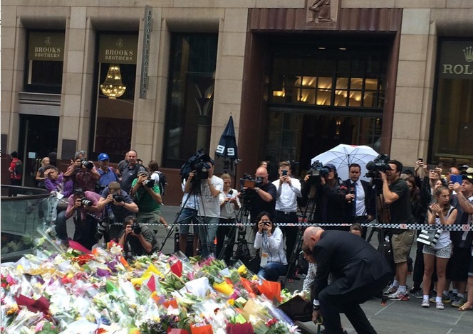 Australia PM lays flowers at memorials for victims