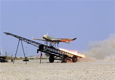 Iranian-made Mohajer drones fly in army drills 