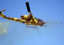 Iran navys gunship helicopter takes action in drills 