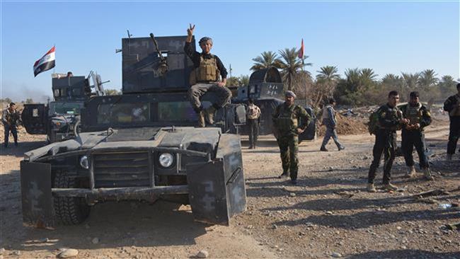 Iraq army, volunteers retake control of strategic road