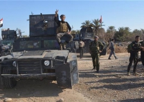 Iraq army, volunteers retake control of strategic road