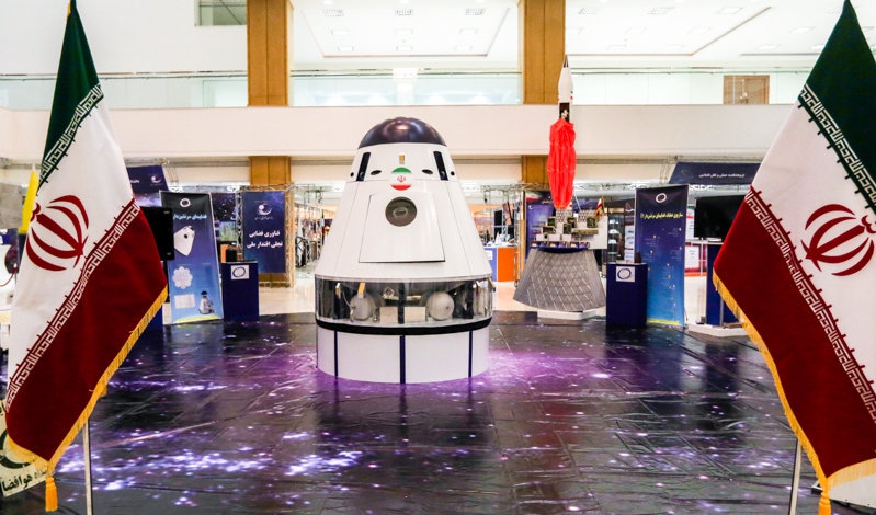 Iran displays manned spacecraft, telecommunications satellite mockups in space expo