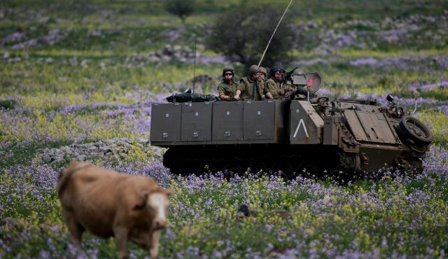 As Israel lets the Syrians battle it out, Iran deters Israel from next door