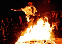 Ancient, modern Iran clash over fire festival
