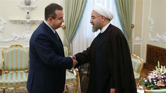 Iran president urges peace in Mideast, Balkans