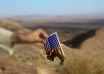 Iranian youth launch campaign of burning U.S. flag (+Photos)