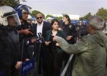 Turkish police, mourners clash near Ankara blasts site