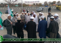 A convoy of Sunni pilgrims heads toward Karbala along with Shias