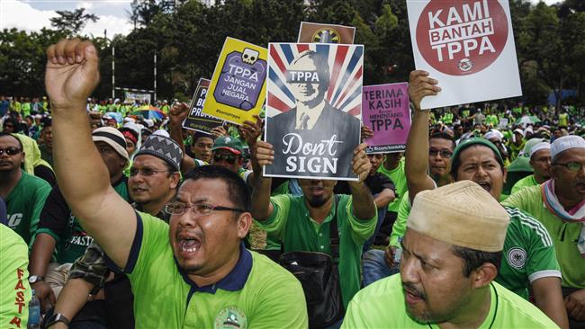 Malaysians rally against US-led trade deal