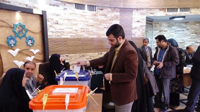 Iranians voting in parliamentary, Assembly of Experts elections